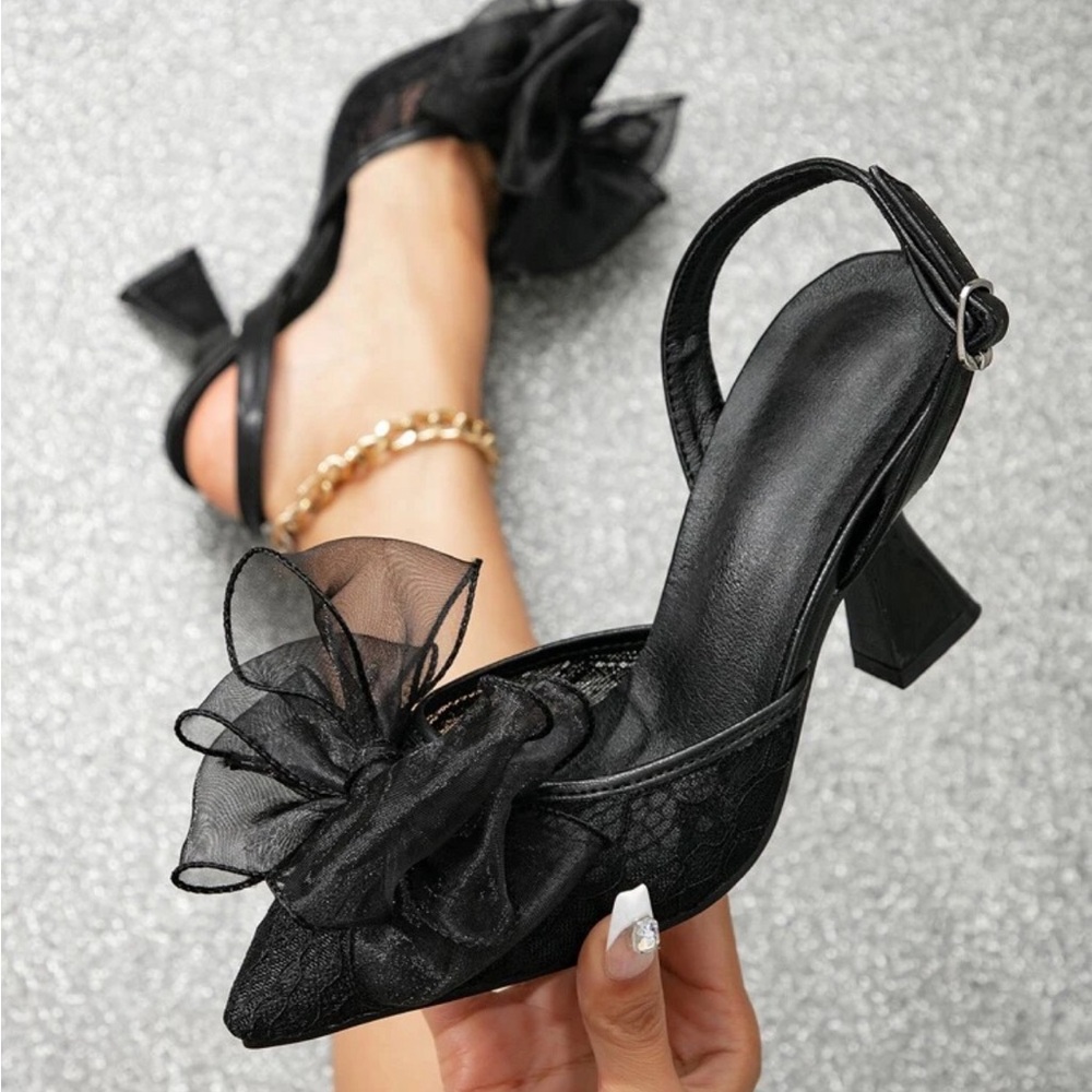 Black bow heels